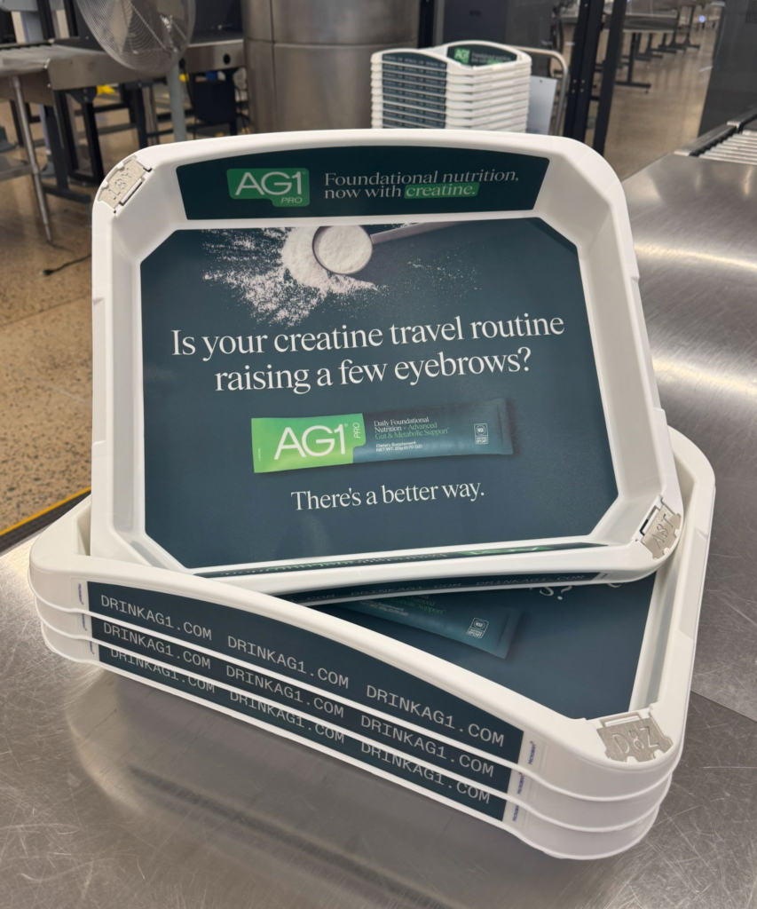AG1 Put Its Ad Inside the Airport Security Tray. Where Loose Creatine Becomes a Problem AG1 Placed Its Ad Inside the Airport Security Tray. Where Loose Creatine Becomes a Problem.