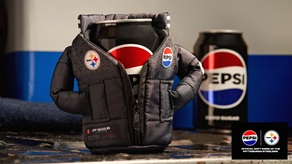 Pepsi dressed its cans in mini NFL puffer jackets under “Tailgating Deserves Pepsi”